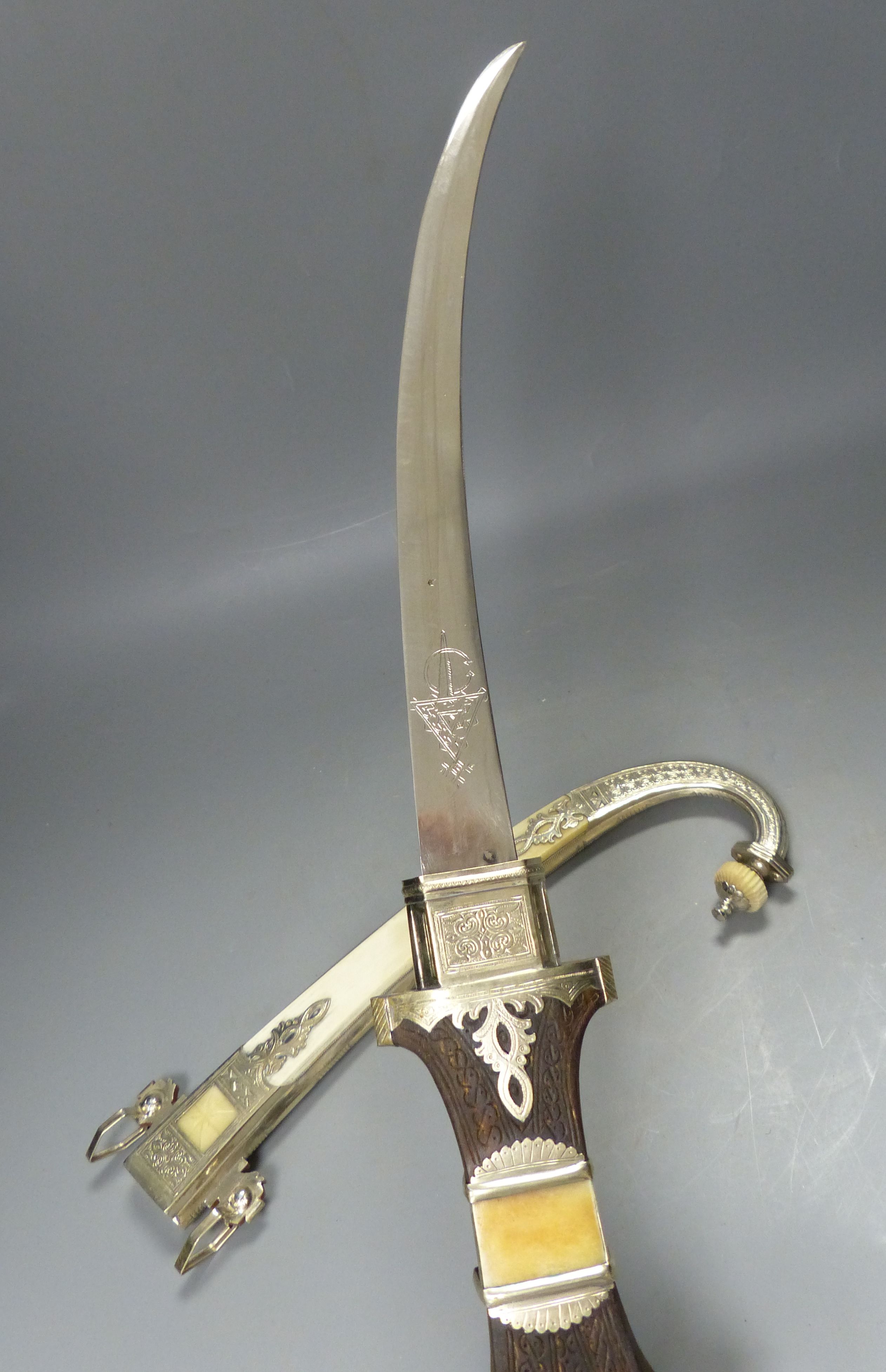 An Islamic silver and bone mounted Jambiya, overall length 60cm